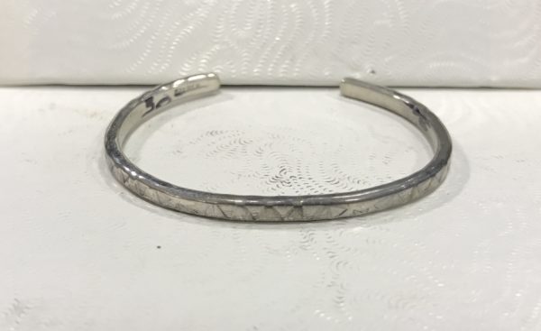 Navajo Elaine Tahe Silver Stamped Cuff Baby Bracelet